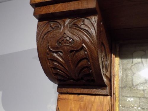 fig 2. A magnificent and rare Arts & Crafts Period oak fireplace probably by Edgar Wood