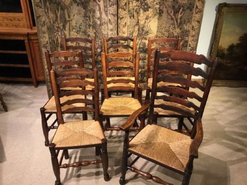 A Set of 8 19th Century Ash and Elm Ladder Back Dining Chairs