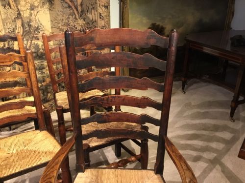 fig 1. A set of 8 19th Century ash and elm ladder back dining chairs