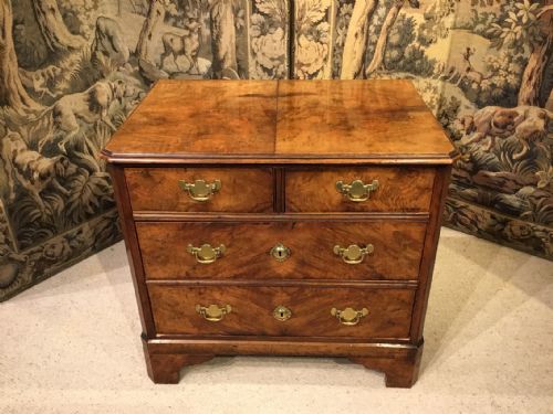 An Edwardian Period Walnut Chest of Drawers
