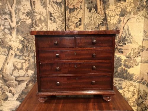 A Victorian Period Mahogany Miniature Chest of Drawers.