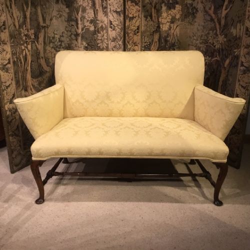 A Walnut George II Style Love Seat