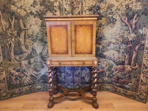 A Fine Quality Burr Walnut and Parcel Gilt Antique Cocktail Cabinet by Waring and Gillows.