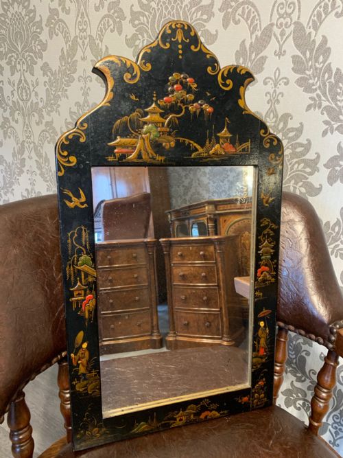 A Small Edwardian Period Ebonised and Chinoiserie Wall Mirror