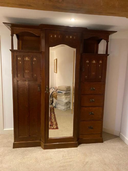 An Arts and Crafts Wardrobe and Dressing Table by Shapland and Petter of Barnstaple