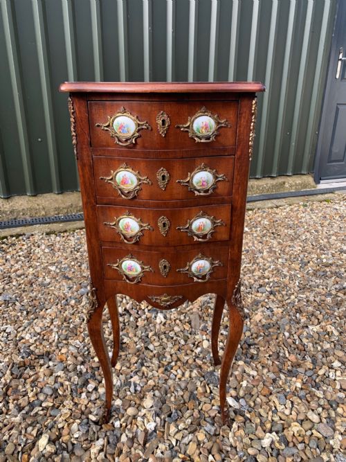 A Good Quality French Mahogany Serpentine Chest with Porcelain Plaques