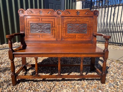 An Elizabethan Revival Antique Oak Hall Bench