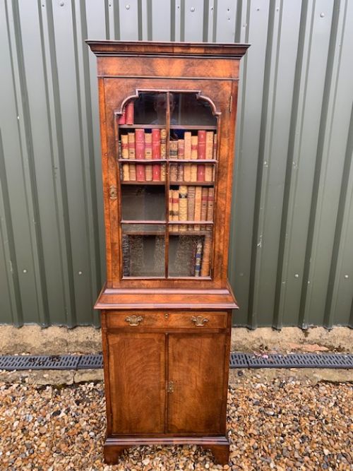 A Petite George I Style Walnut Antique Bookcase.