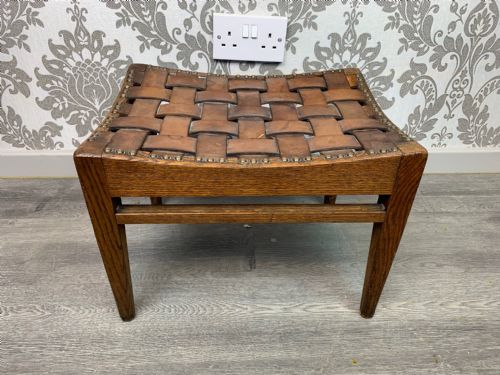 An Arts & Crafts Period Arthur Simpson Oak and Leather Stool