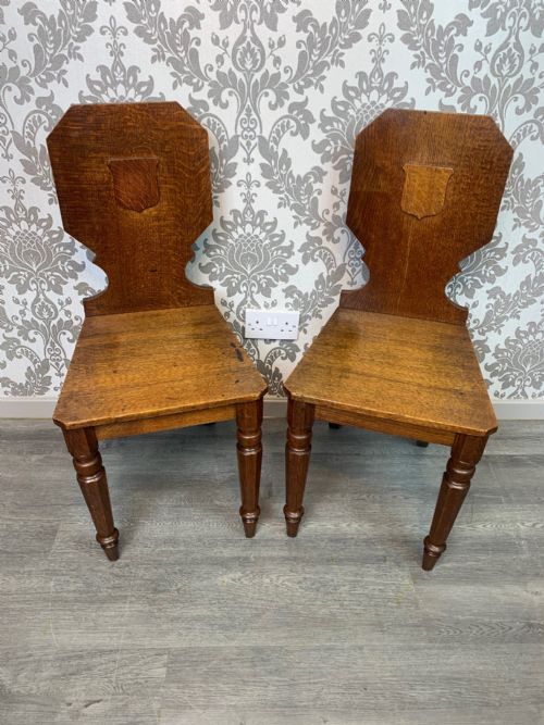 A Lovely Pair of Early Victorian Period Oak Hall Chairs
