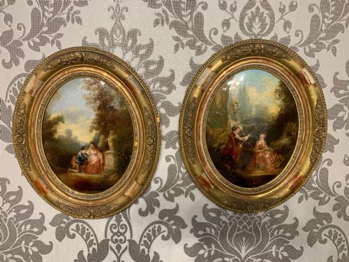 A Pair of 19th Century Small Oval Reverse Paintings on Glass