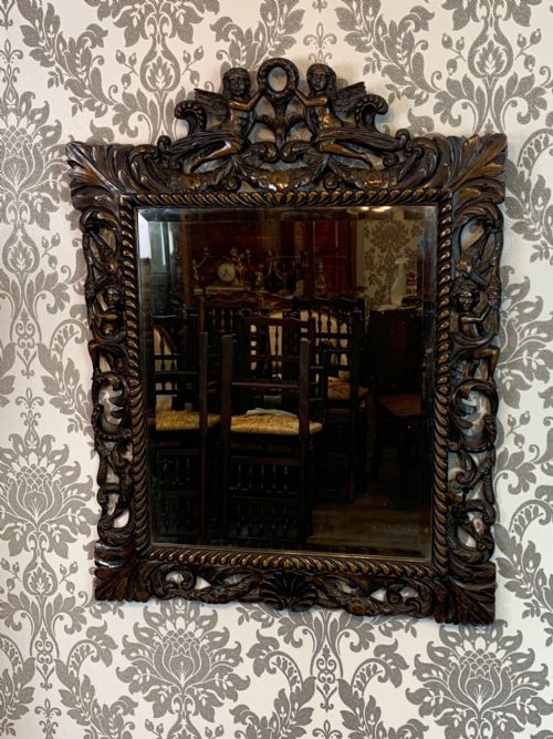 A William & Mary Style Carved Walnut Mirror