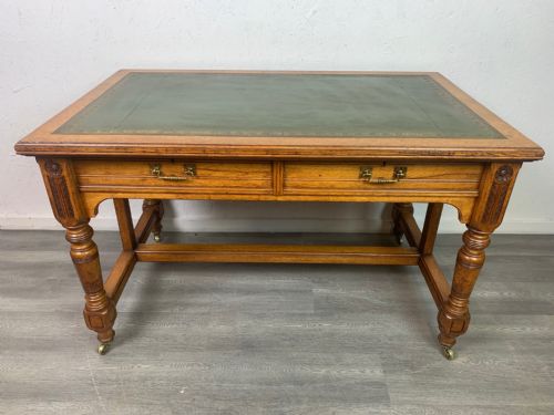 A Victorian Period Gillows Oak Writing Table Designed by Bruce Talbert