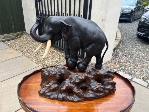 A Large Japanese Meiji Period Bronze Elephant on Stand
