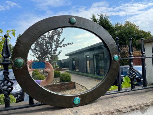 An Arts and Crafts Period Liberty & Co. Of London Wall Mirror.