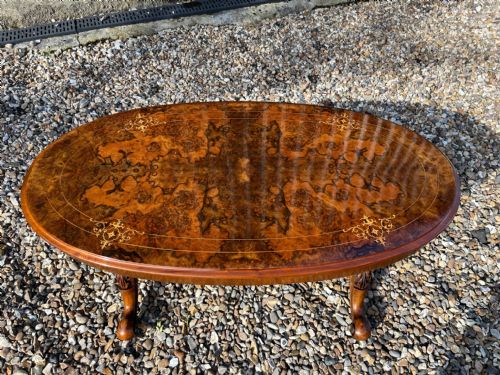A Fine Quality Victorian Period Burr Walnut Oval Coffee Table