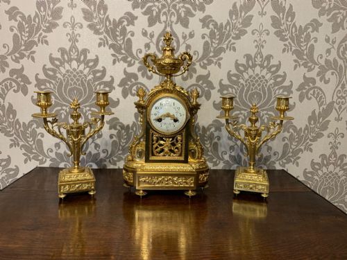 A Fine Quality Gilt Brass French Clock Garniture.