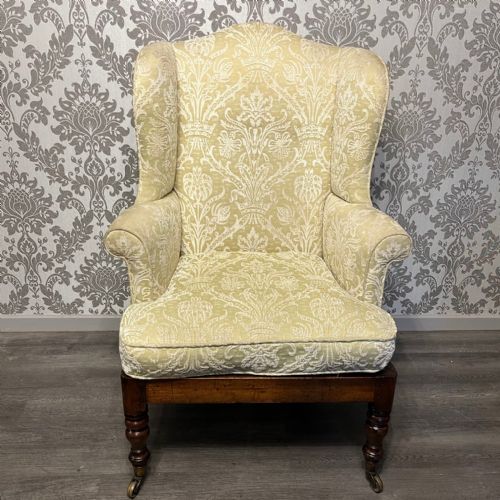 A Mid 19th Century Mahogany Antique Winged Armchair