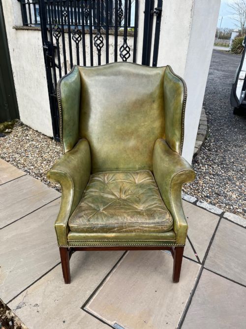 A Good Leather Antique Wing Armchair