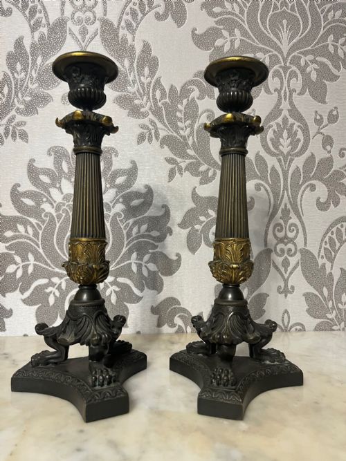 A Pair of Regency Period Bronze Candle Sticks