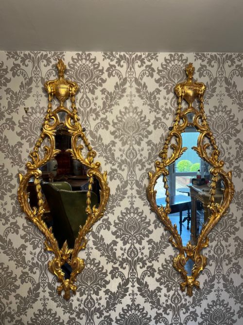 A Fine Quality Pair of French Carved Gilt Wood Mirrors