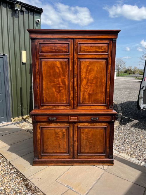 A Large Scale Figured Mahogany Scottish Estate Cupboard