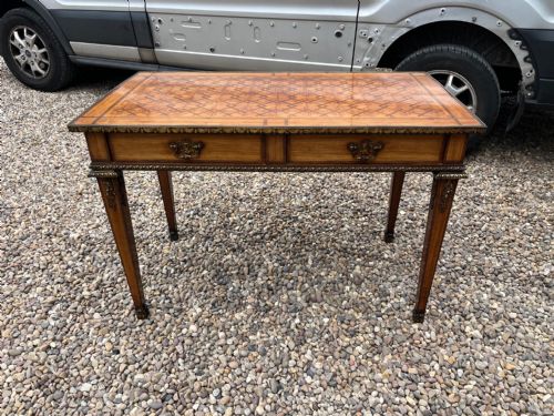 A Fine Quality Kingwood and Purple Heart Victorian Period Library Table