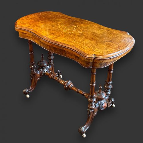 A Victorian Period Burr Walnut Inlaid Games Table