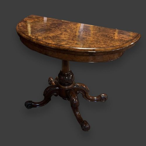 A Fine Quality Victorian Period Burr Walnut Demi Lune Fold Over Game Table.