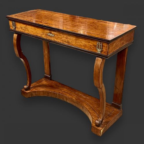 A French Empire Period Plum Pudding Mahogany Console Table