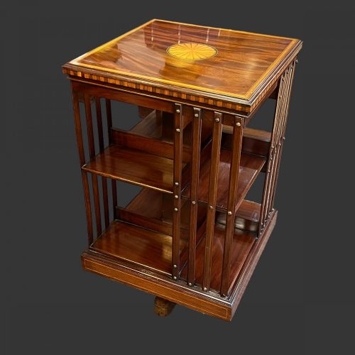 An Edwardian Period Mahogany Inlaid Revolving Bookcase.