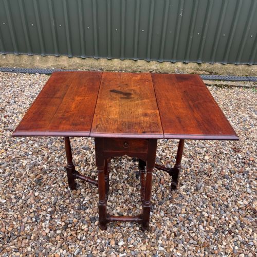 A Late 17th Century Walnut Gate Leg Table