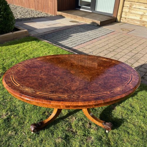 A Victorian Period Oval Burr Walnut and Marquetry Inlaid Coffee Table