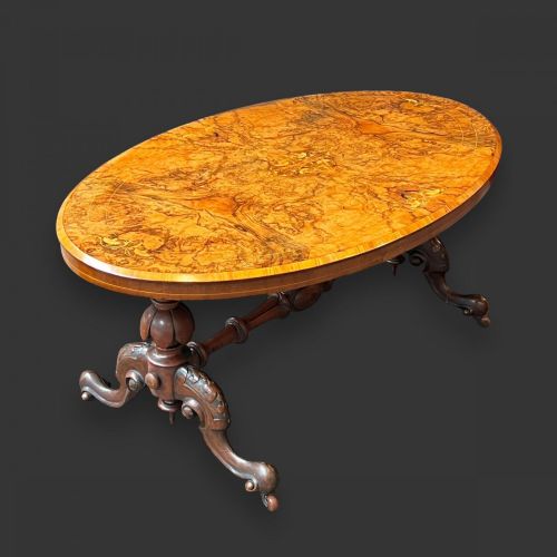 A Victorian Period Oval Burr Walnut Coffee Table