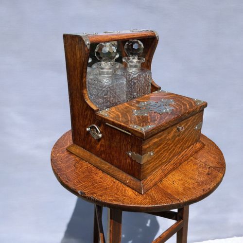 A Late Victorian Period Oak Tantalus/games Compendium.