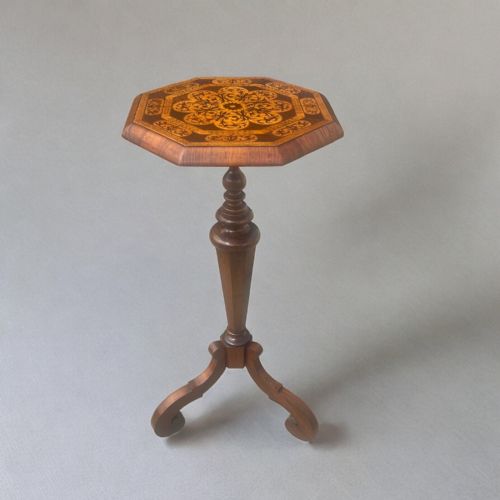 A William and Mary Style Walnut and Marquetry Inlaid Table.