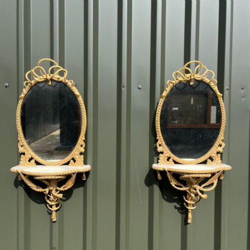A Fine Quality Pair of French Carved Gilt Wood Mirrors