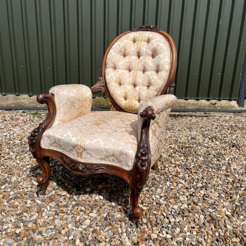 A Victorian Period Carved Walnut Open Armchair