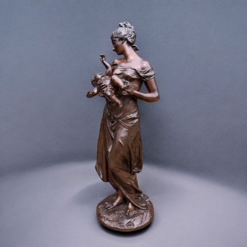 A Finely Cast Bronze Figure Depicting a Mother with Cherub