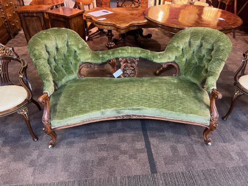 A Victorian Period Walnut Sofa