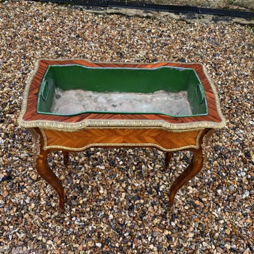 A Late 19th Century French Kingwood, Rosewood and Ormolu Serpentine Planter