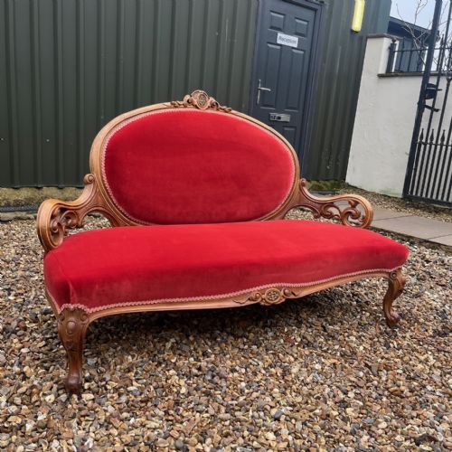 A Stunning Victorian Period Carved Walnut Sofa