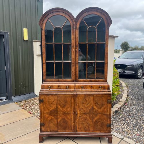 A George I Style Walnut Double Domed Cabinet.