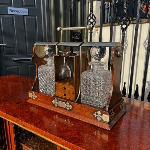 A Late Victorian Period Oak and Silver Plated Two Bottle Tantalus