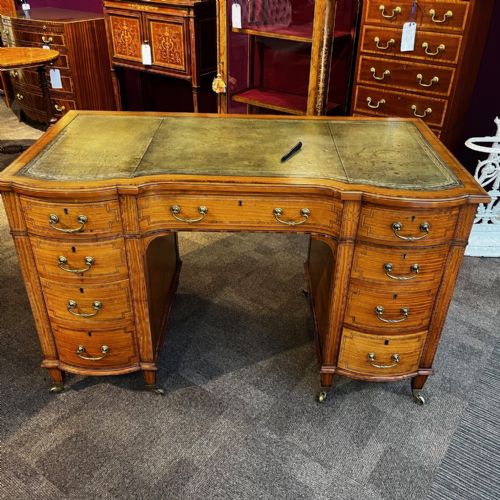 A Late Victorian Period Satinwood Desk.