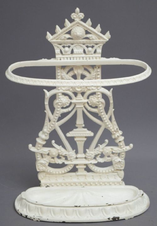A VICTORIAN PERIOD CAST IRON UMBRELLA STAND WALKING STICK STAND