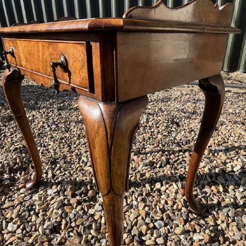 A George I Style walnut side table by Tozer of London. View IV