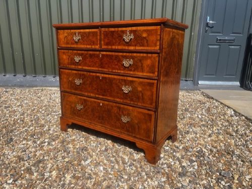 A George II Style Burr Walnut Chest of Drawers