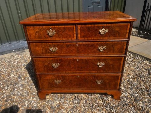 A George II Style Burr Walnut Chest Of Drawers View IV