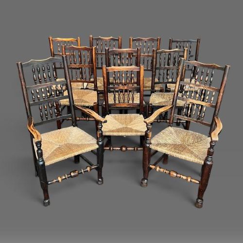 A set of ten Victorian oak Lancashire spindle back farmhouse dining chairs